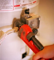 a Lafayette water heater repair technician on the job